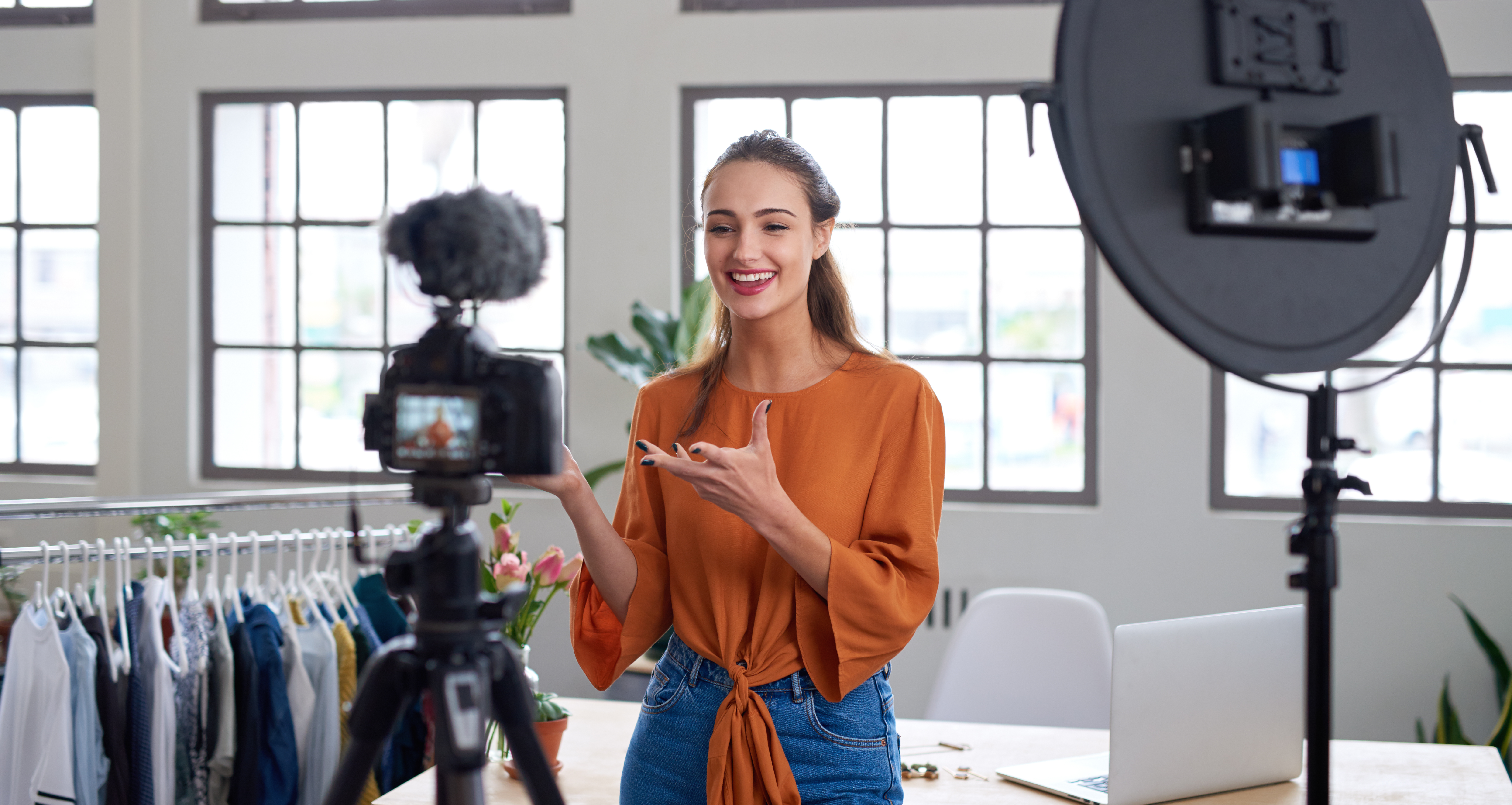 Image of an influencer talking to a camera.