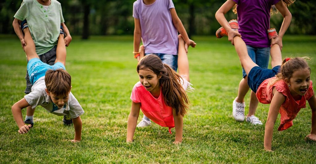 Wheelbarrow Relay groups games for kids